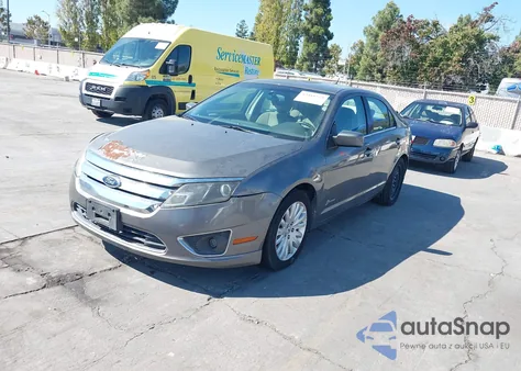 2010 Ford Fusion Hybrid z USA, uszkodzony, nr VIN 3FADP0L39AR406448